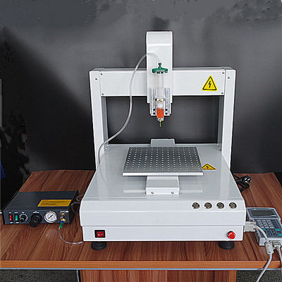 Dispenser automatico della colla delle singole asce liquide di precisione 3